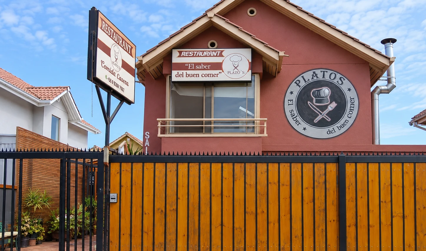 Frontis del restaurant Plato's, con su letrero y el logo pintado en la fachada